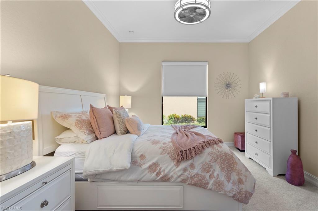 6564 Roma Way Naples, FL 34113 - Photo 10 of 18 a bedroom with a bed and with furniture