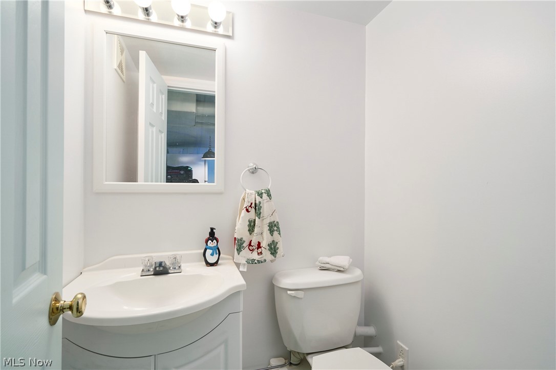 1359 Beaconfield Road Lyndhurst, OH 44124 - Photo 17 of 26 Bathroom with vanity and toilet