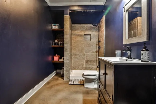 a bathroom with a sink and a toilet