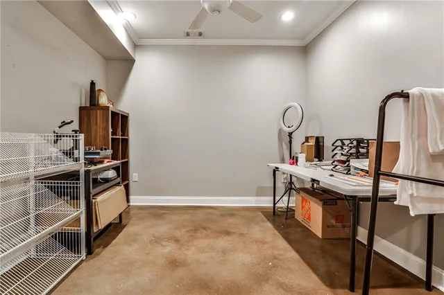 a view of a storage & utility room with racks on the wall