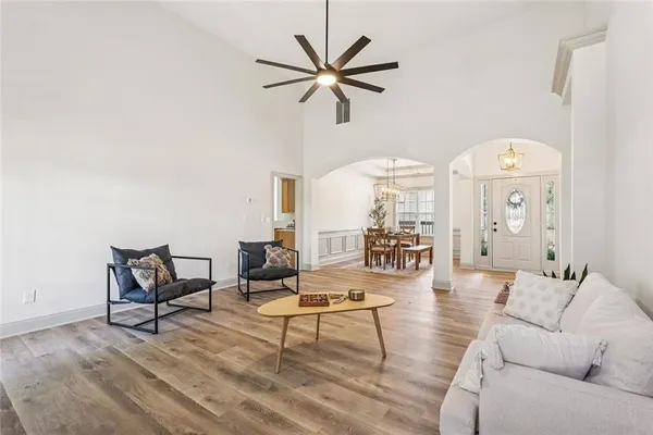 a view of a dining room with furniture window and wooden floor