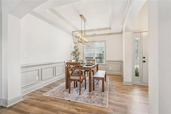a kitchen with stainless steel appliances a stove a microwave and cabinets