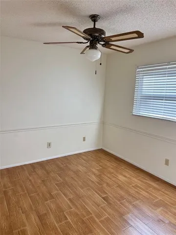 a view of a room with an empty shelf