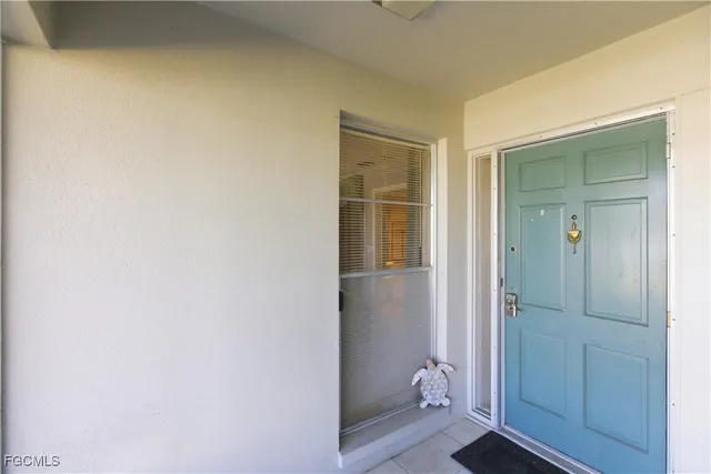 a bathroom with a glass door shower