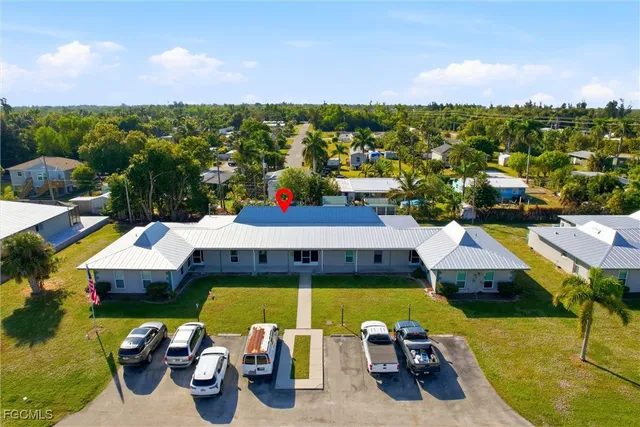 a view of a terrace with a table and chairs