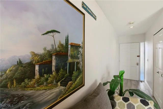 a glass door with a potted plant