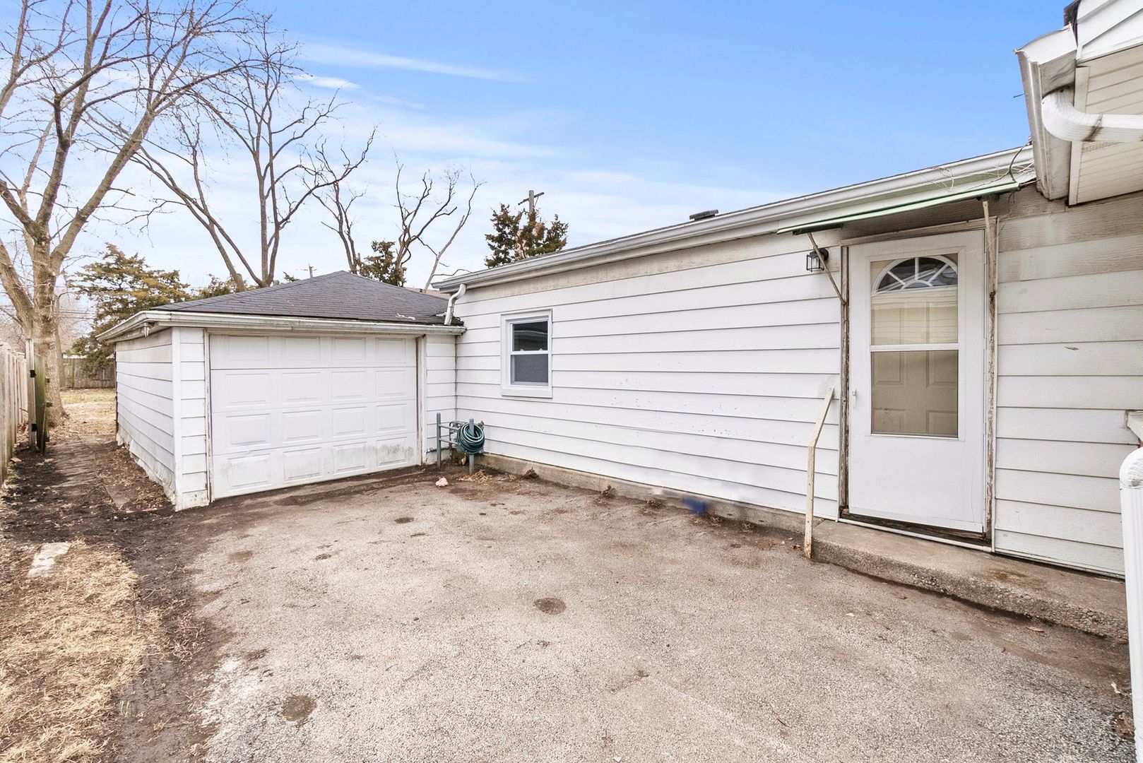 7911 45th Street Lyons, IL 60534 - Photo 16 of 22 a view of a house with a garage