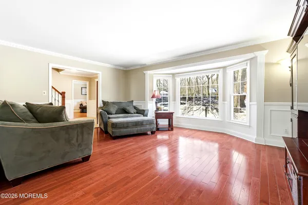 a kitchen with stainless steel appliances granite countertop a refrigerator and a stove