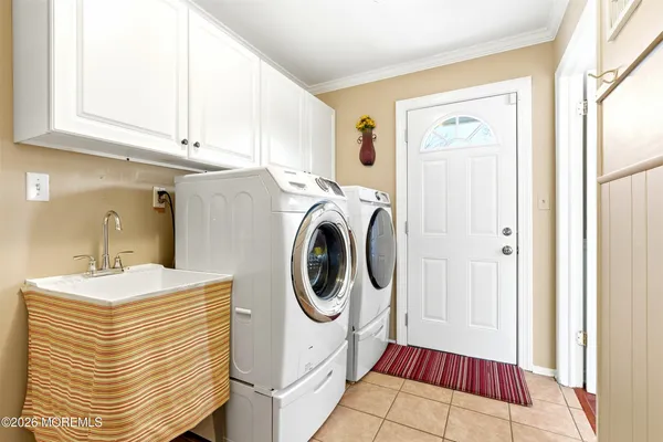 a bathroom with a granite countertop sink mirror vanity and a toilet