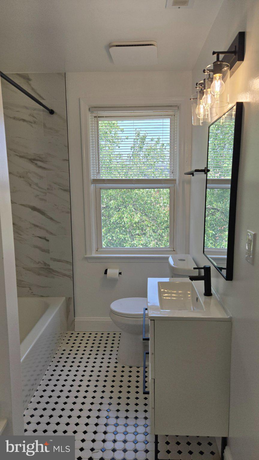 3820 Elkader Road Baltimore, MD 21218 - Photo 32 of 41 Bright and modern bathroom oasis.