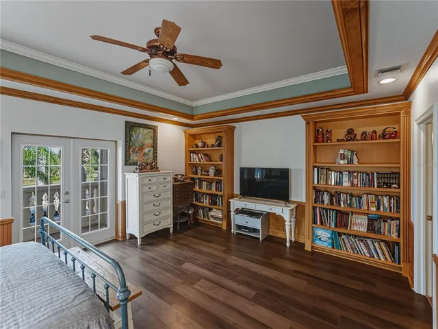 a view of a livingroom with furniture and a flat screen tv