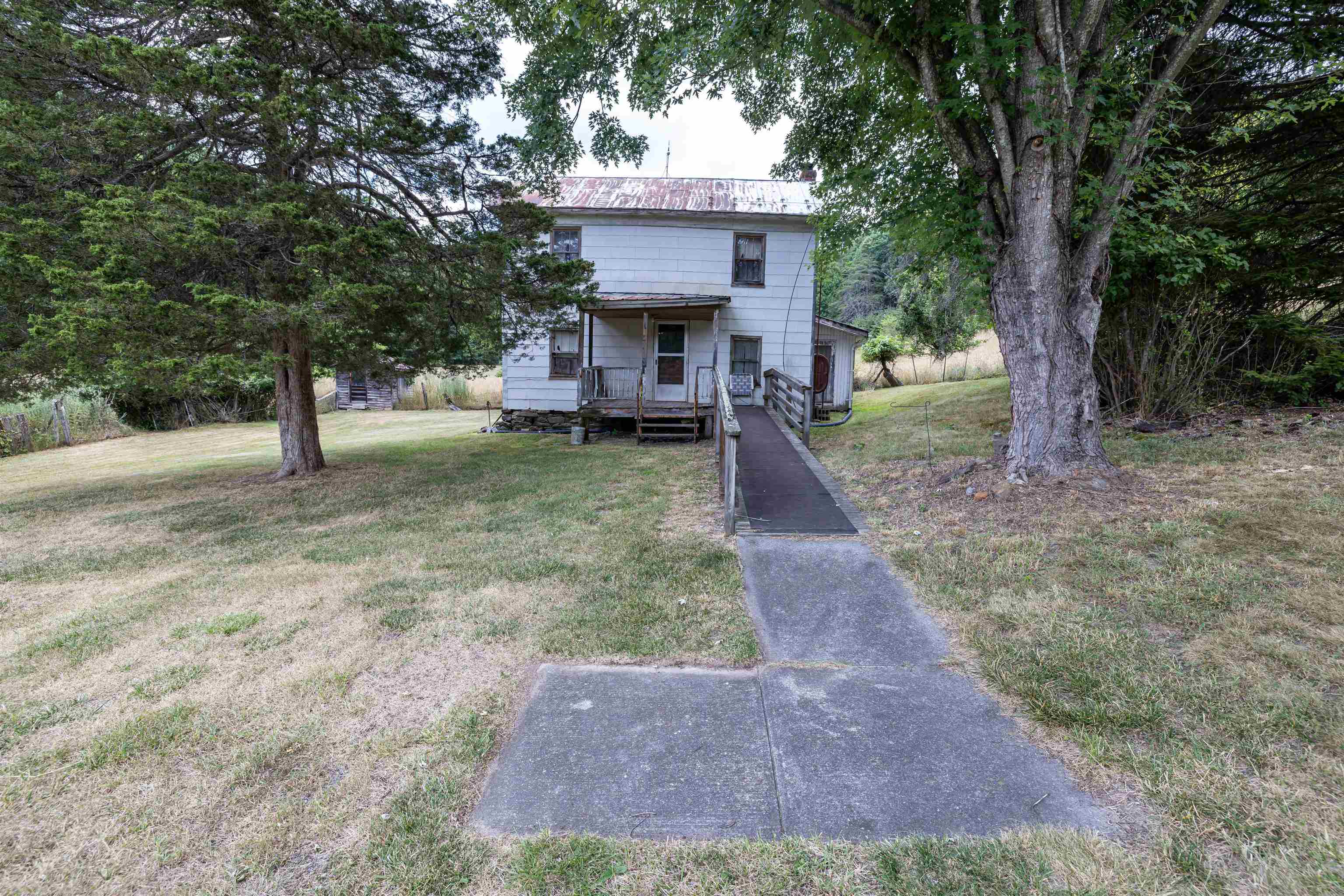 22590 Criders Road Criders, VA 22820 - Photo 66 of 70 a view of a house with a yard and tree