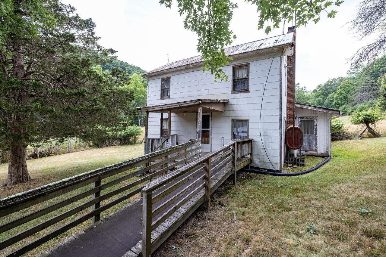 22590 Criders Road Criders, VA 22820 - Photo 67 of 70 a view of a house with backyard and sitting area