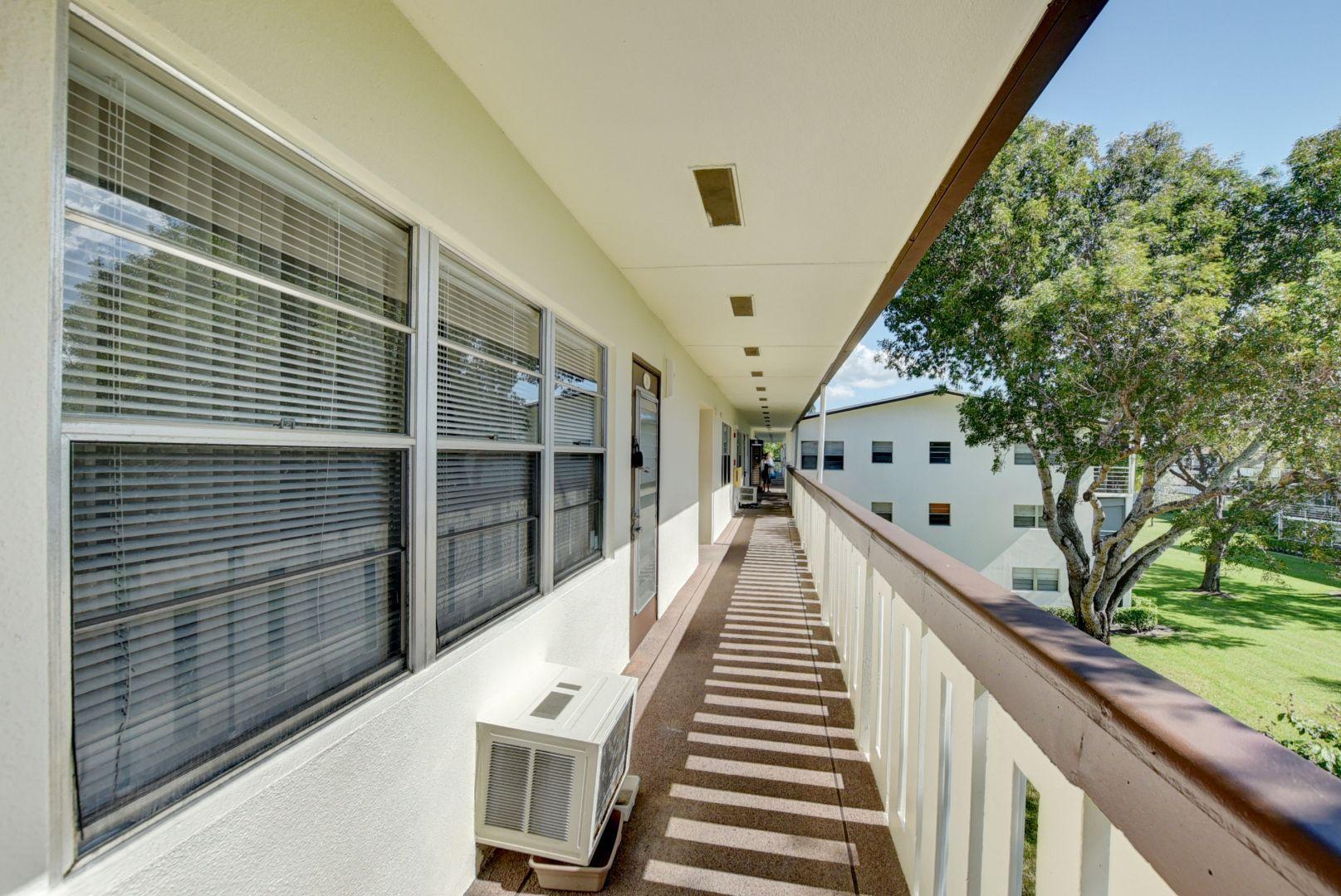 246 Suffolk F Boca Raton, FL 33434 - Photo 2 of 15 a view of a balcony