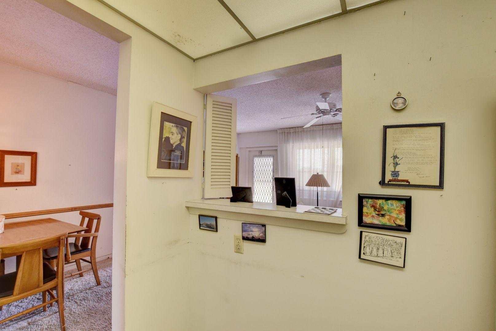 246 Suffolk F Boca Raton, FL 33434 - Photo 4 of 15 a living room with furniture and a table