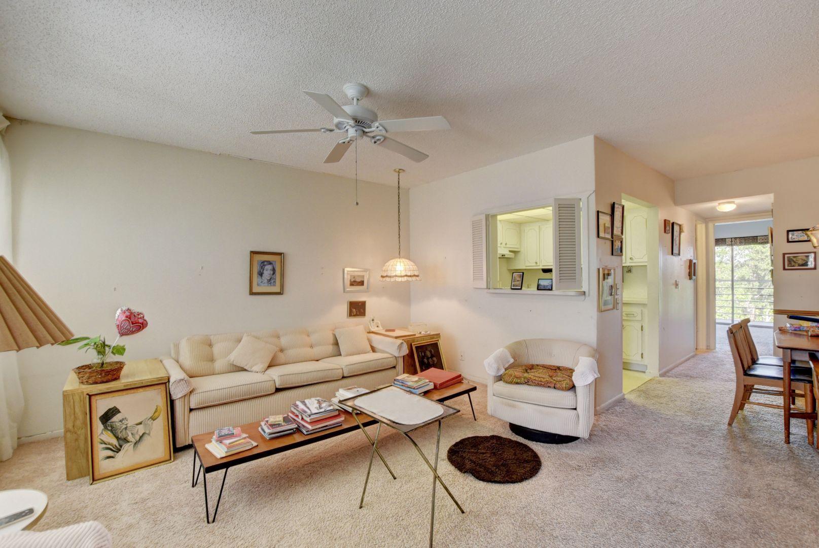 246 Suffolk F Boca Raton, FL 33434 - Photo 8 of 15 a living room with furniture