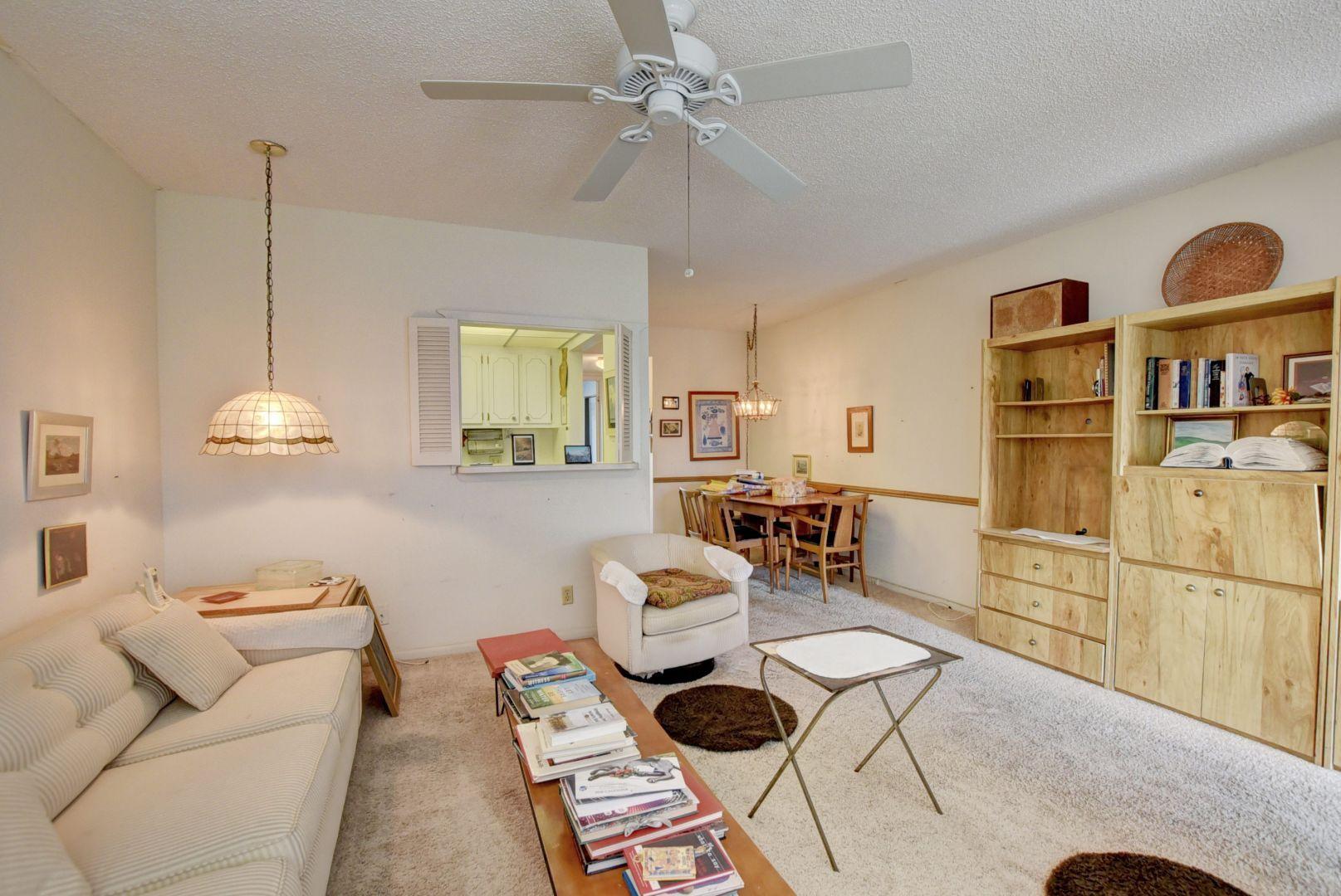 246 Suffolk F Boca Raton, FL 33434 - Photo 9 of 15 a living room with furniture and decor