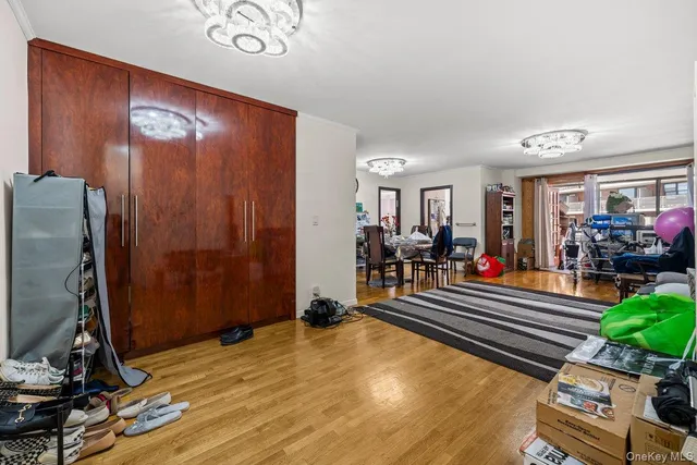 a room with lots of chairs and mirrors