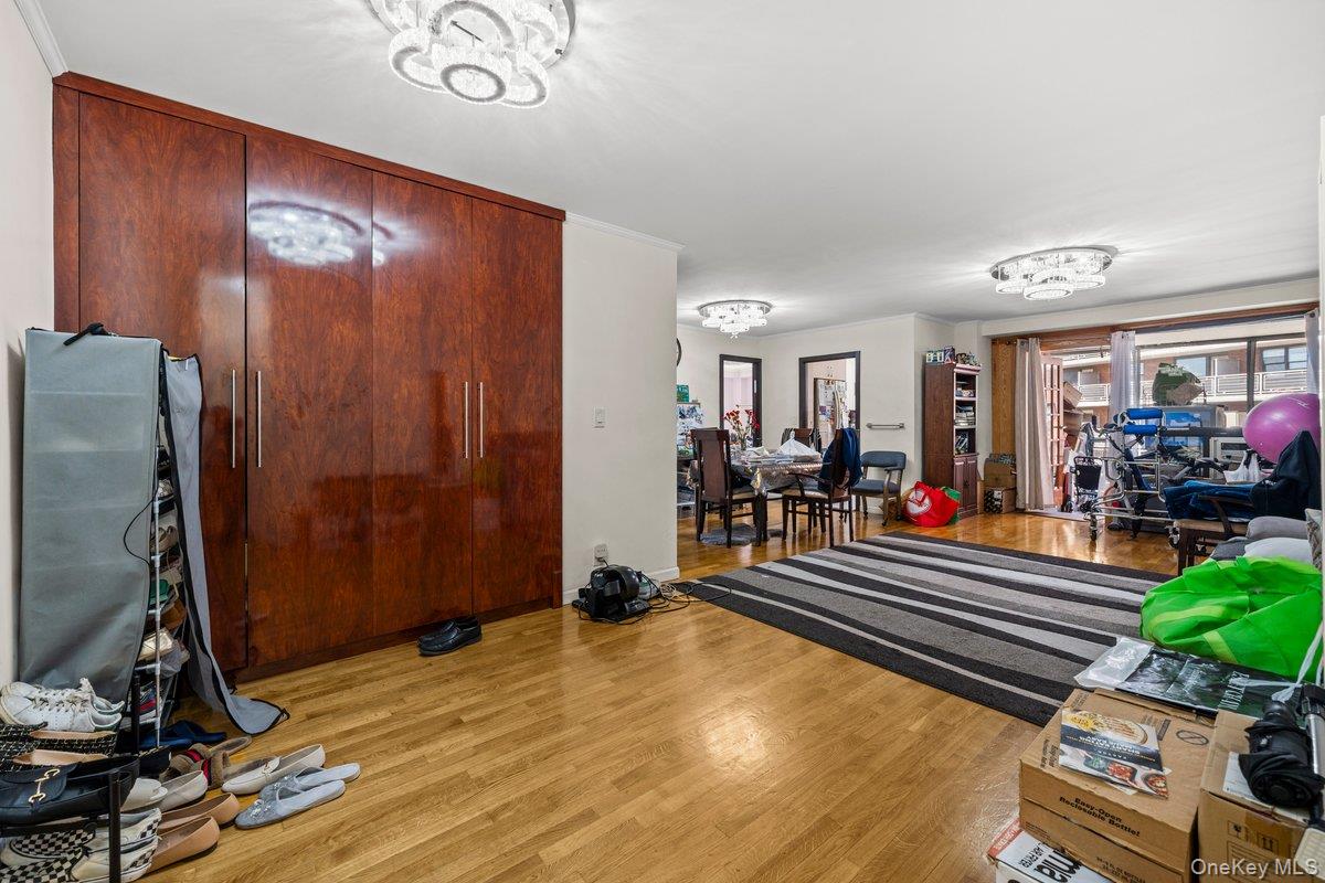 6135 98th Street, Unit 8D Queens, NY 11374 - Photo 13 of 17 a room with lots of chairs and mirrors