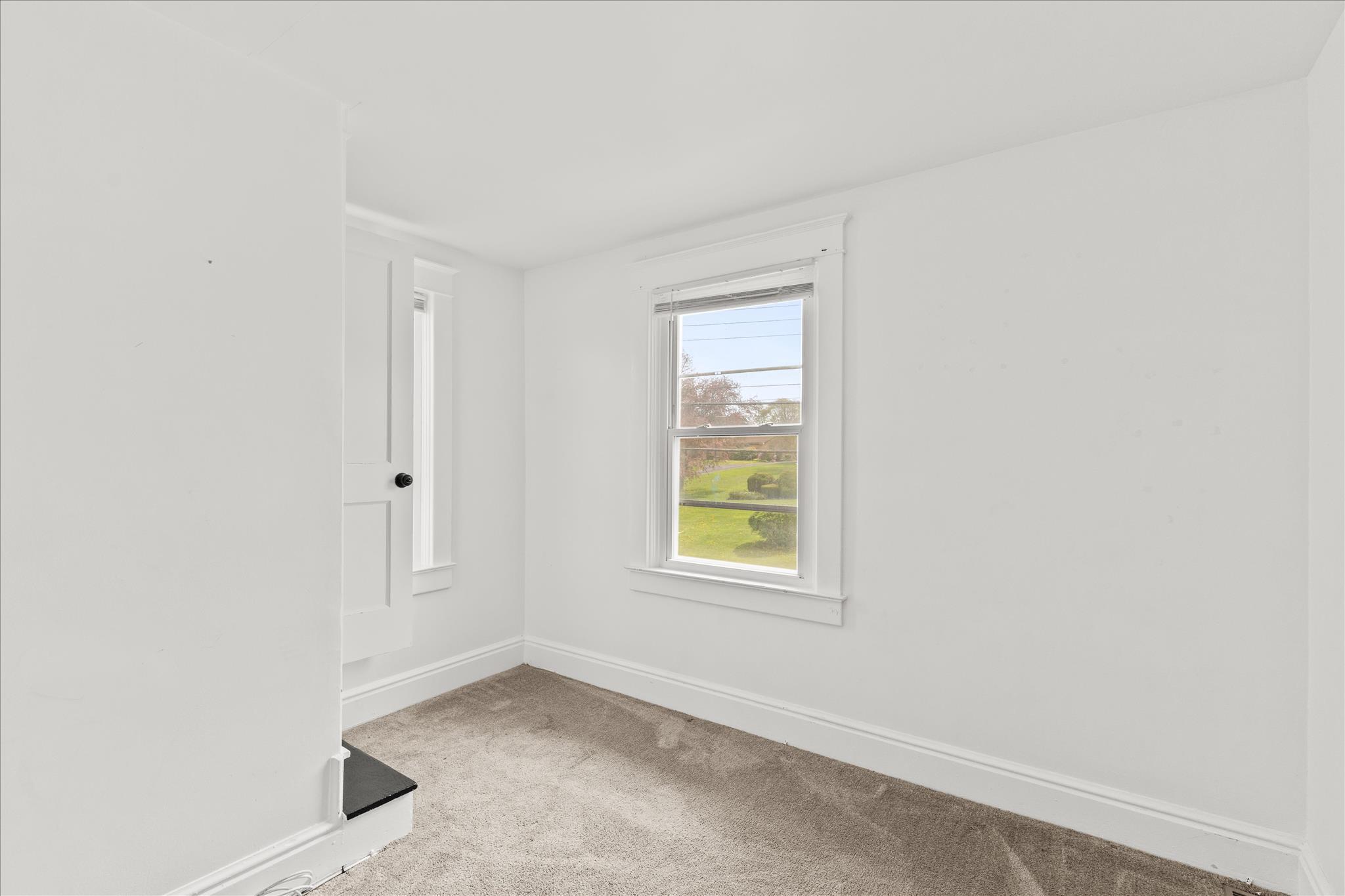 310 Hanover Road York, PA 17408 - Photo 23 of 56 an empty room with windows