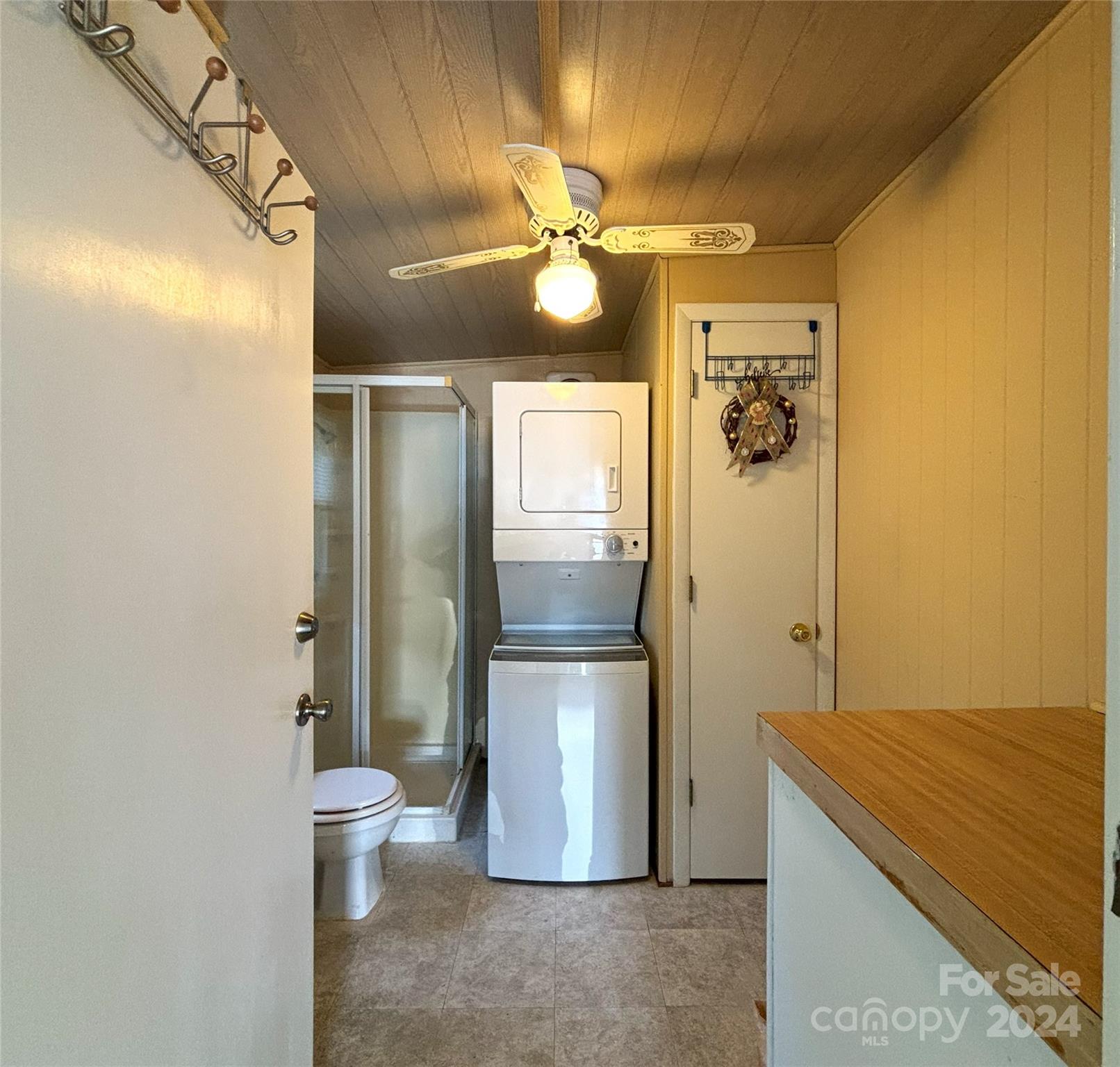 306 Mallard Loop Waynesville, NC 28785 - Photo 20 of 34 a kitchen with stainless steel appliances a refrigerator and a chandelier