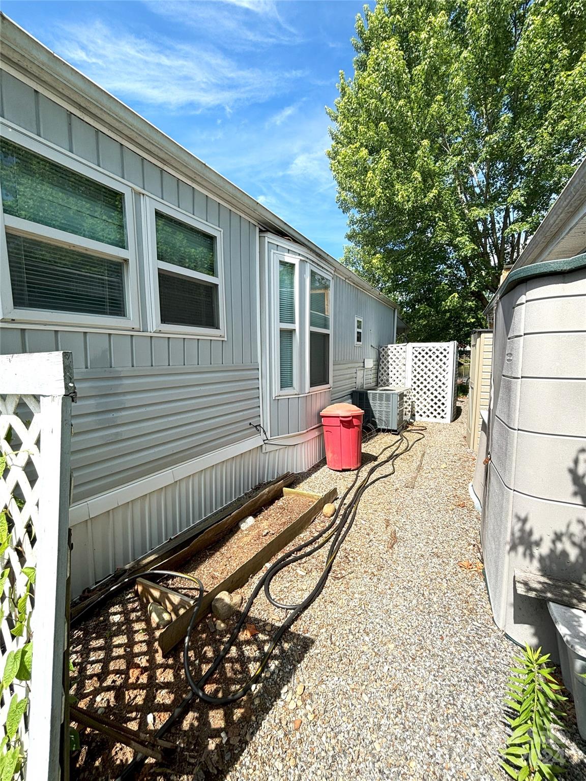 306 Mallard Loop Waynesville, NC 28785 - Photo 29 of 34 a view of backyard with wooden fence and large trees