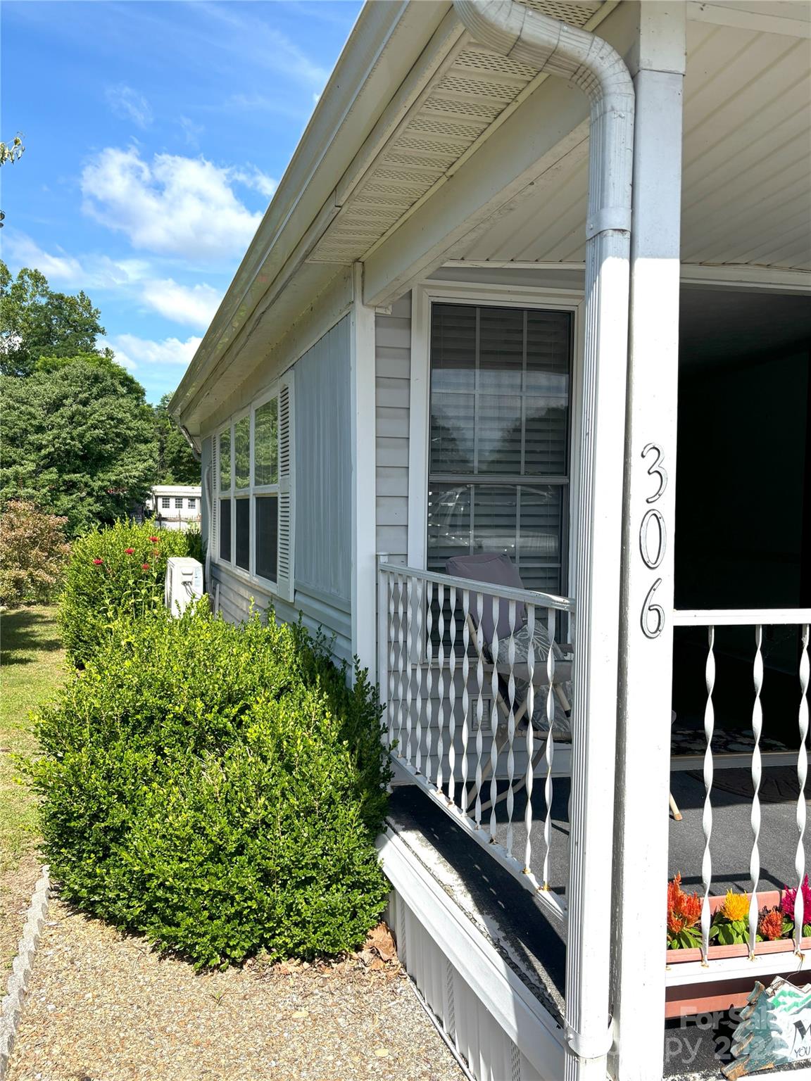 306 Mallard Loop Waynesville, NC 28785 - Photo 30 of 34 a view of a balcony with a potted plant
