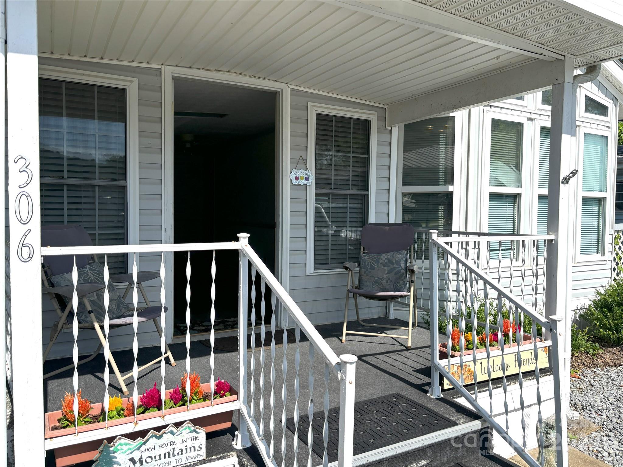306 Mallard Loop Waynesville, NC 28785 - Photo 3 of 34 a view of balcony with furniture