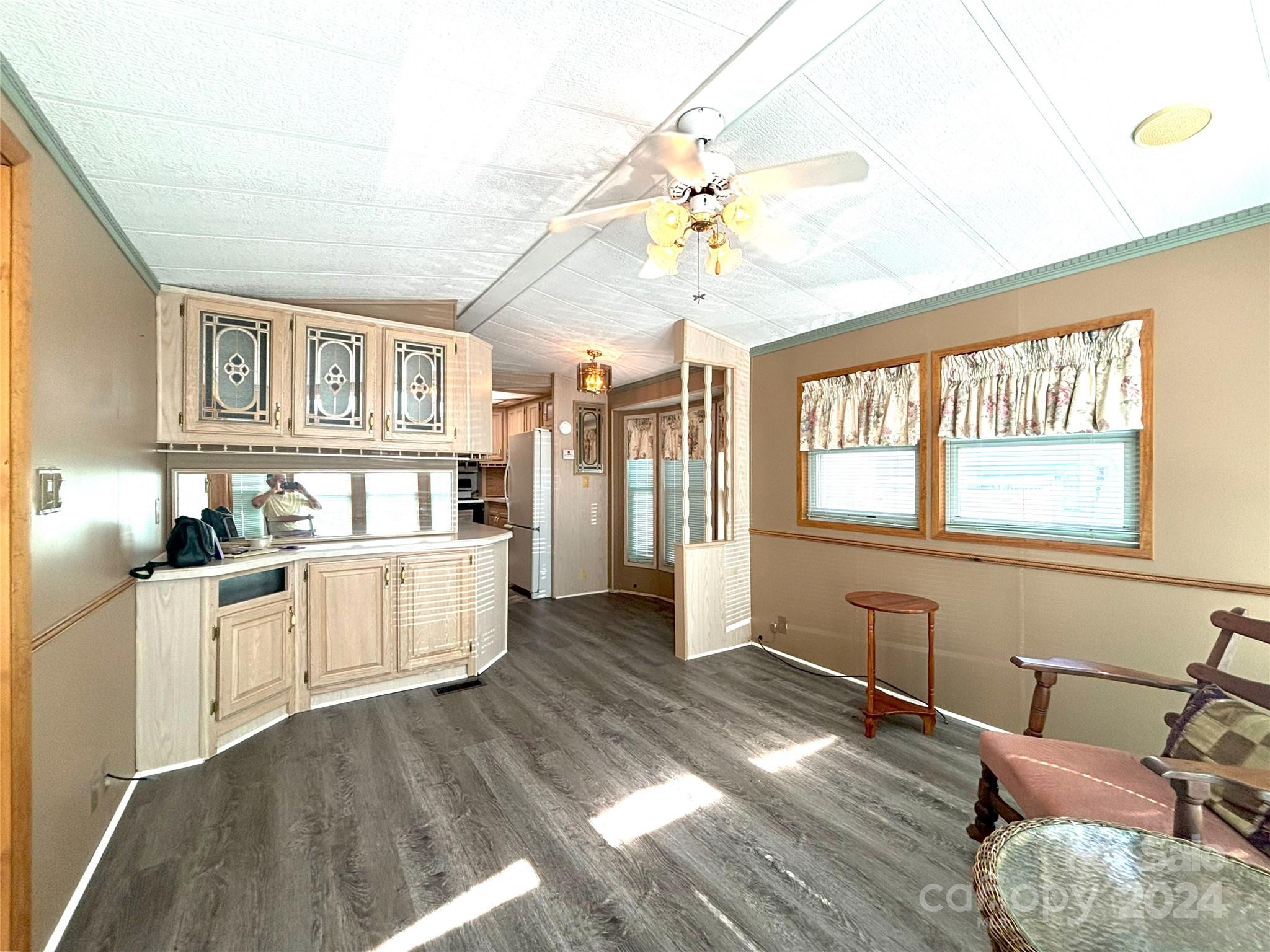 306 Mallard Loop Waynesville, NC 28785 - Photo 8 of 34 a view of a kitchen with furniture and windows