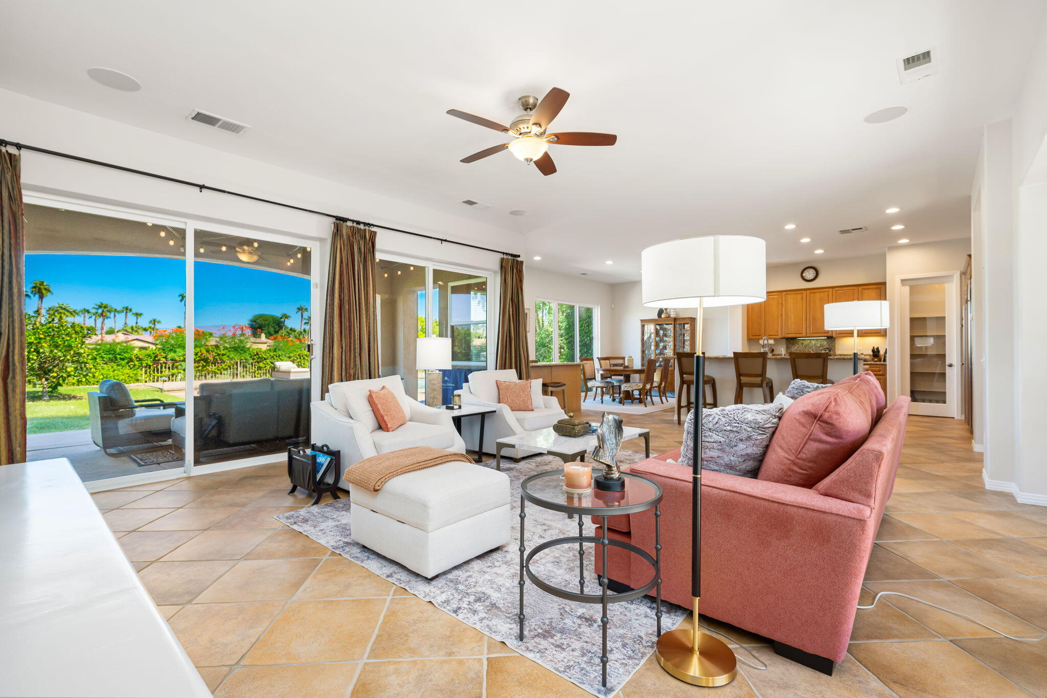 81260 Golf View Drive La Quinta, CA 92253 - Photo 13 of 58 a living room with furniture and a large window