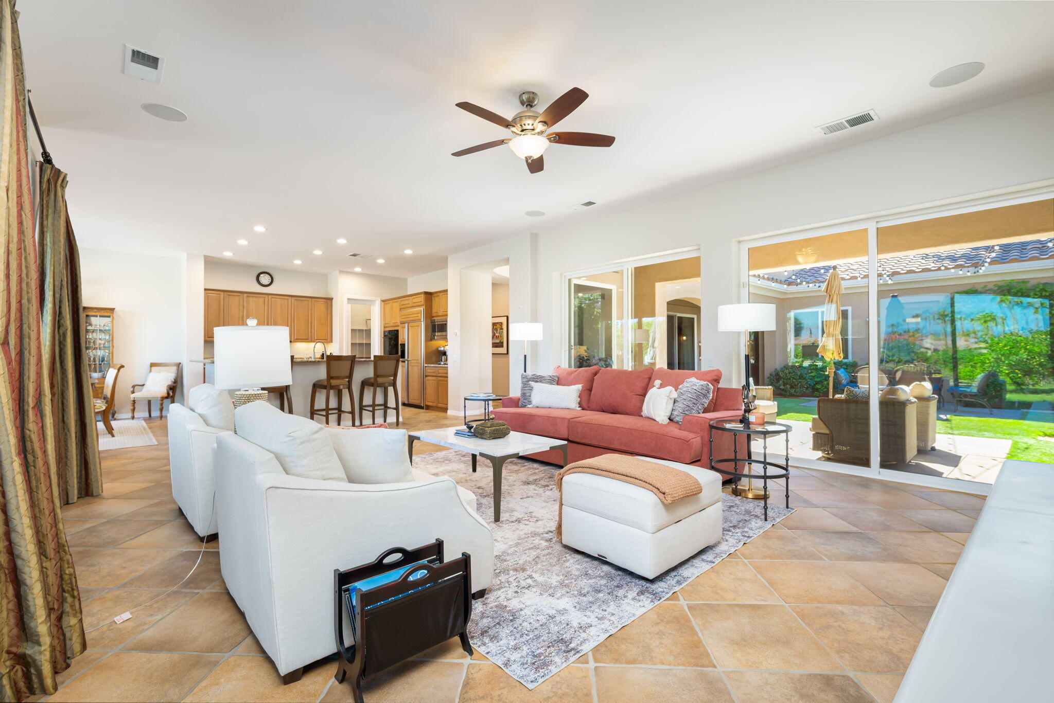 81260 Golf View Drive La Quinta, CA 92253 - Photo 14 of 58 a living room with furniture and a large window
