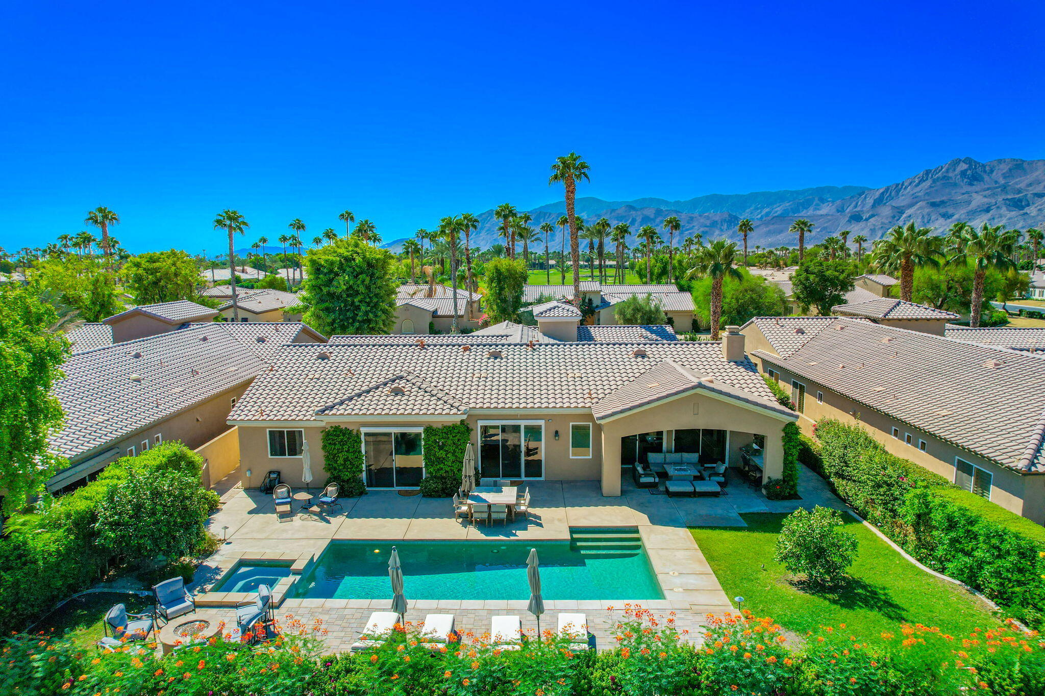 81260 Golf View Drive La Quinta, CA 92253 - Photo 2 of 58 a aerial view of a house with swimming pool garden and patio