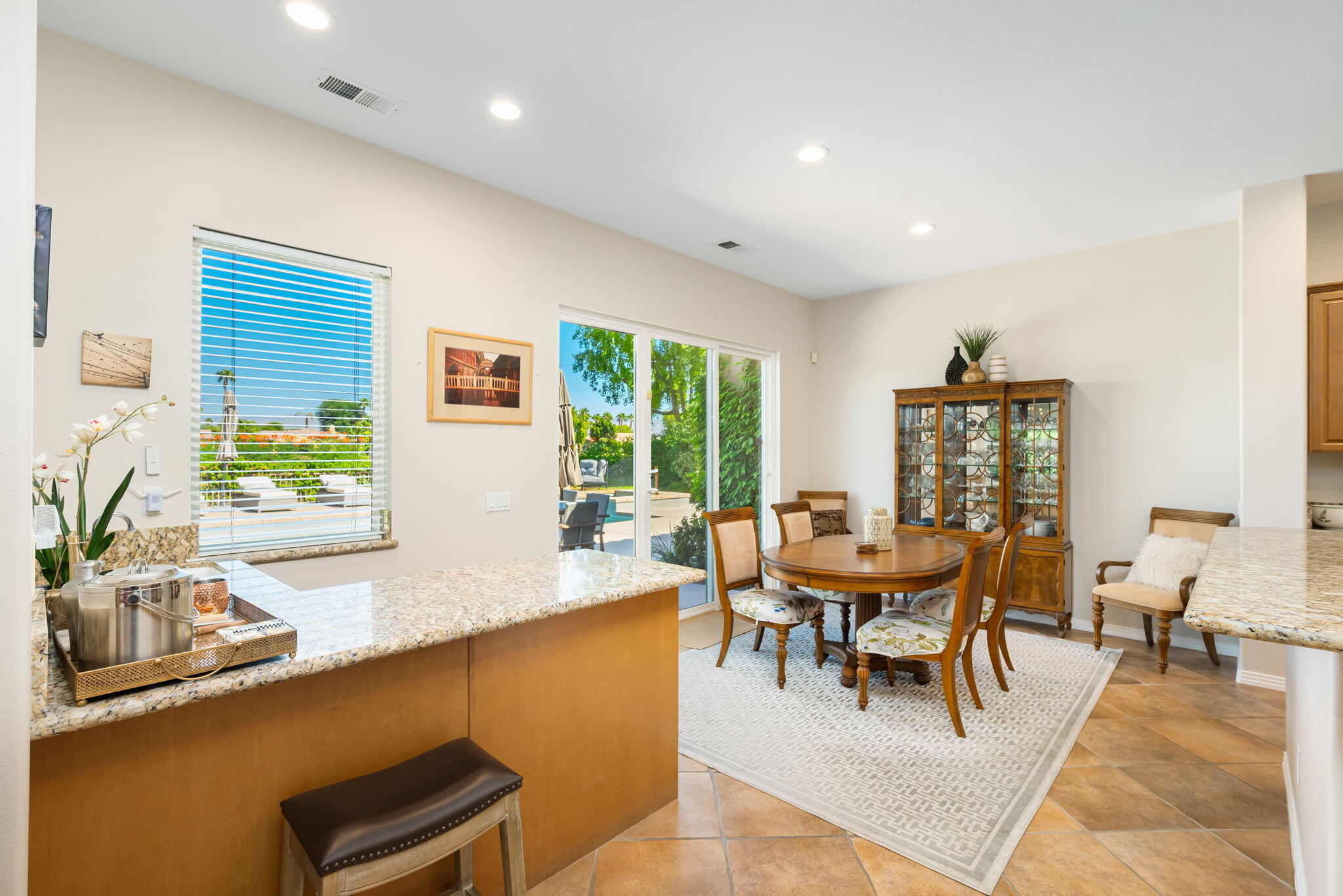 81260 Golf View Drive La Quinta, CA 92253 - Photo 21 of 58 a dining room with furniture and window