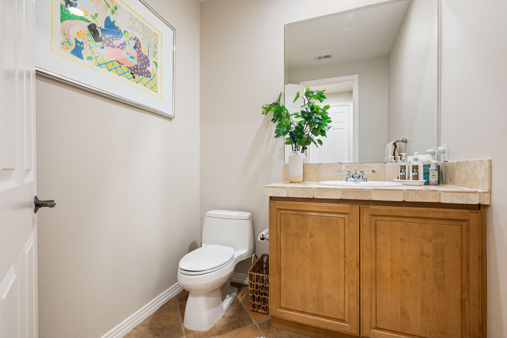 81260 Golf View Drive La Quinta, CA 92253 - Photo 24 of 58 a bathroom with a toilet sink and mirror
