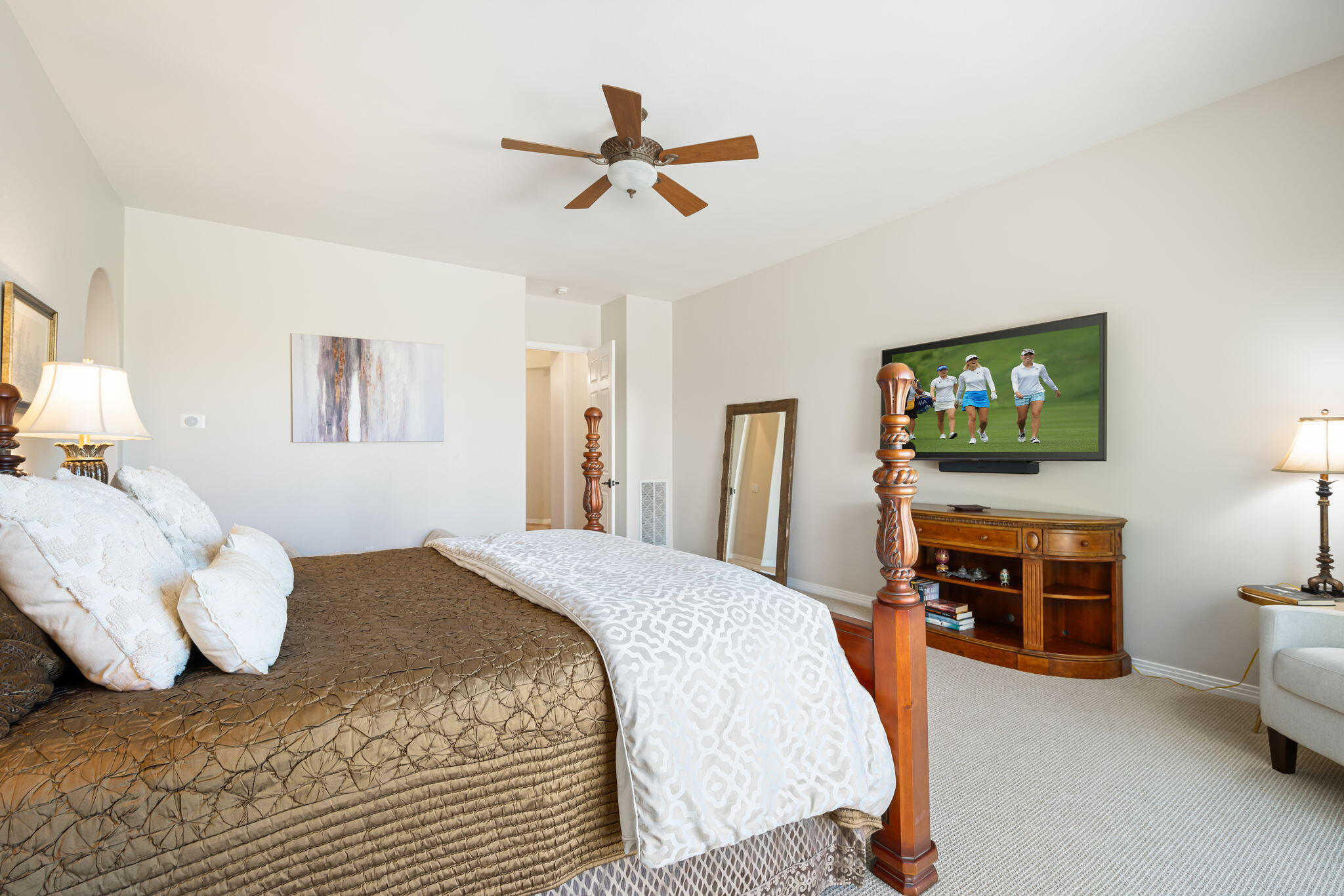 81260 Golf View Drive La Quinta, CA 92253 - Photo 26 of 58 a bedroom with a bed and a flat screen tv