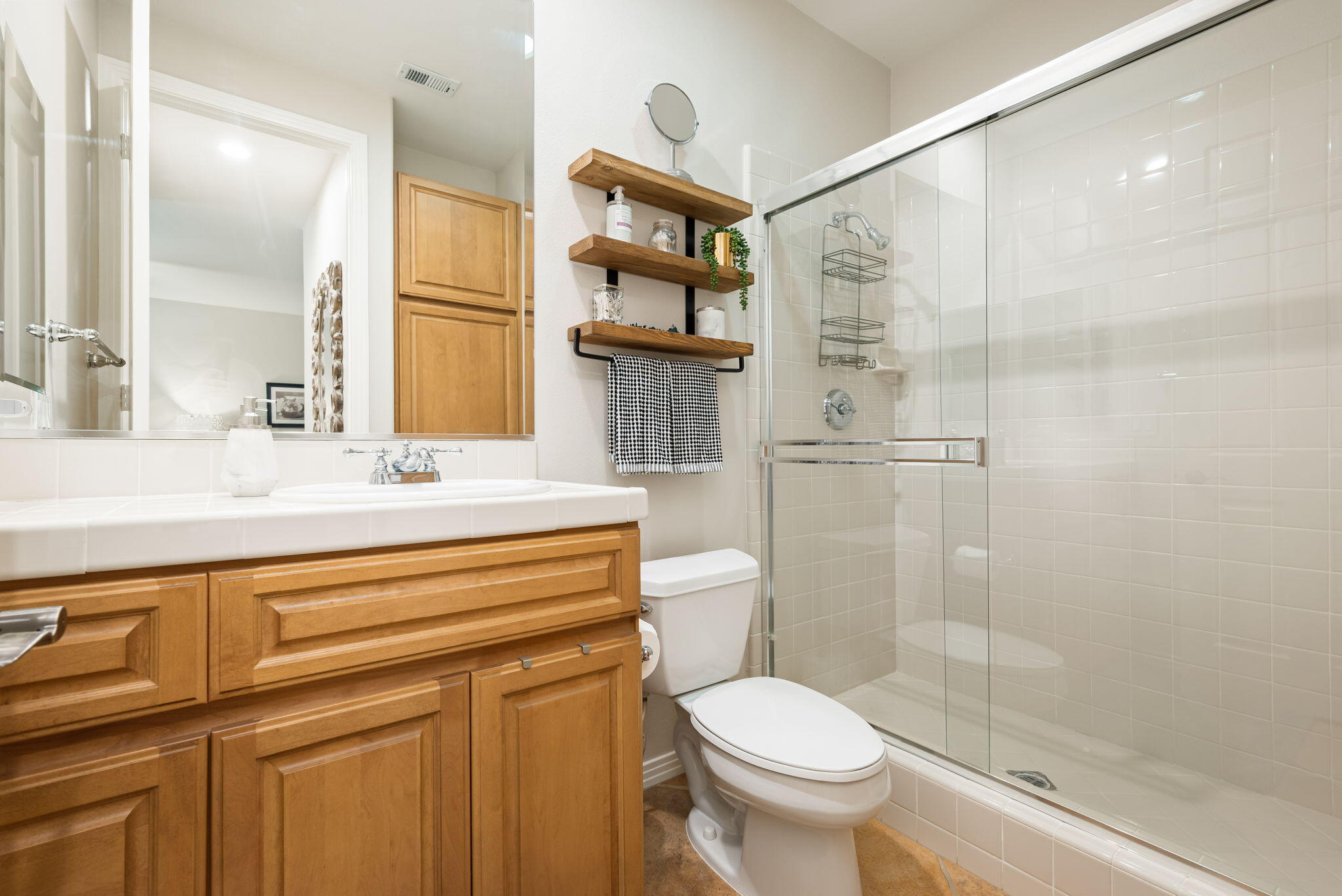 81260 Golf View Drive La Quinta, CA 92253 - Photo 31 of 58 a bathroom with a sink a toilet and shower