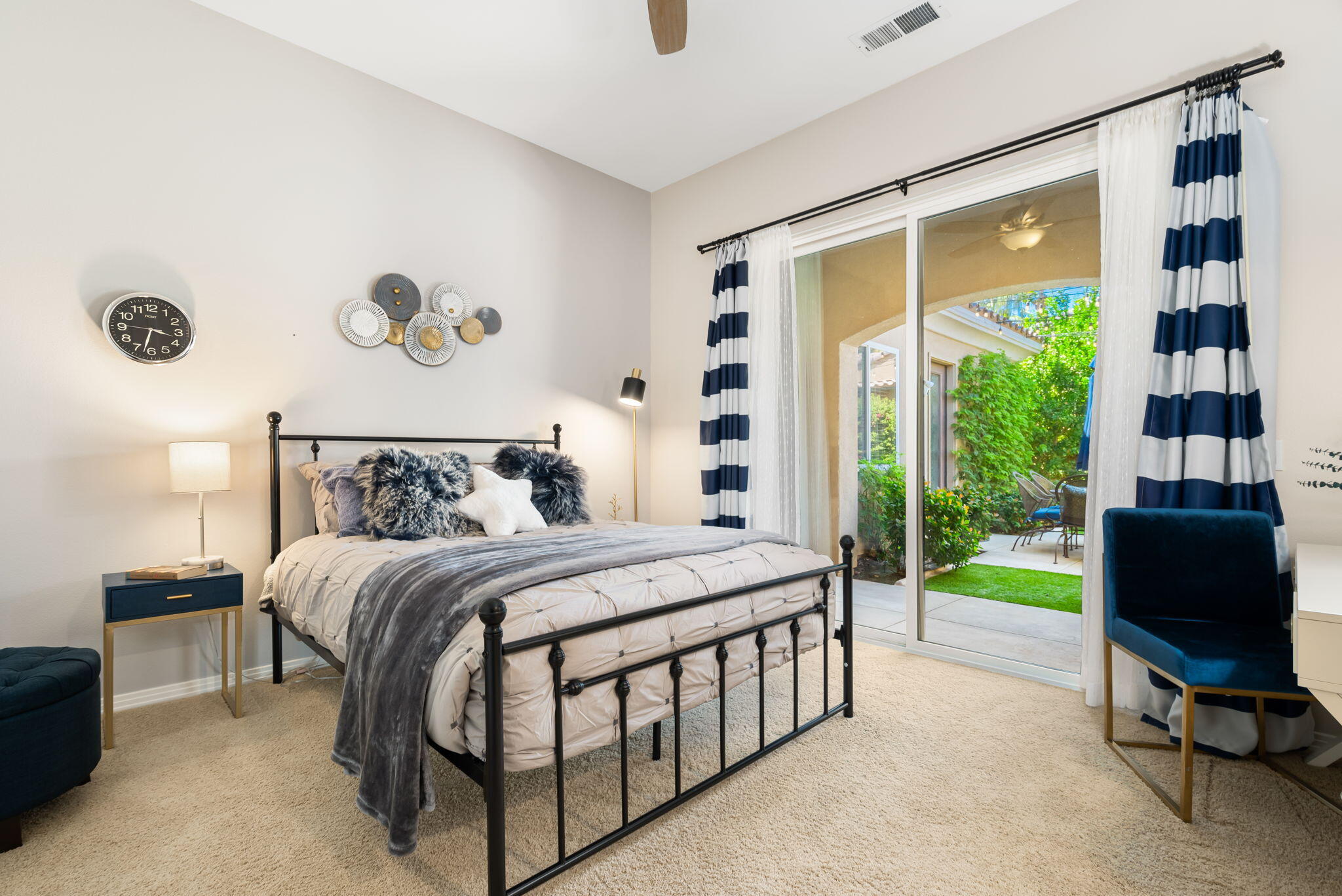 81260 Golf View Drive La Quinta, CA 92253 - Photo 32 of 58 a bedroom with a bed and a window