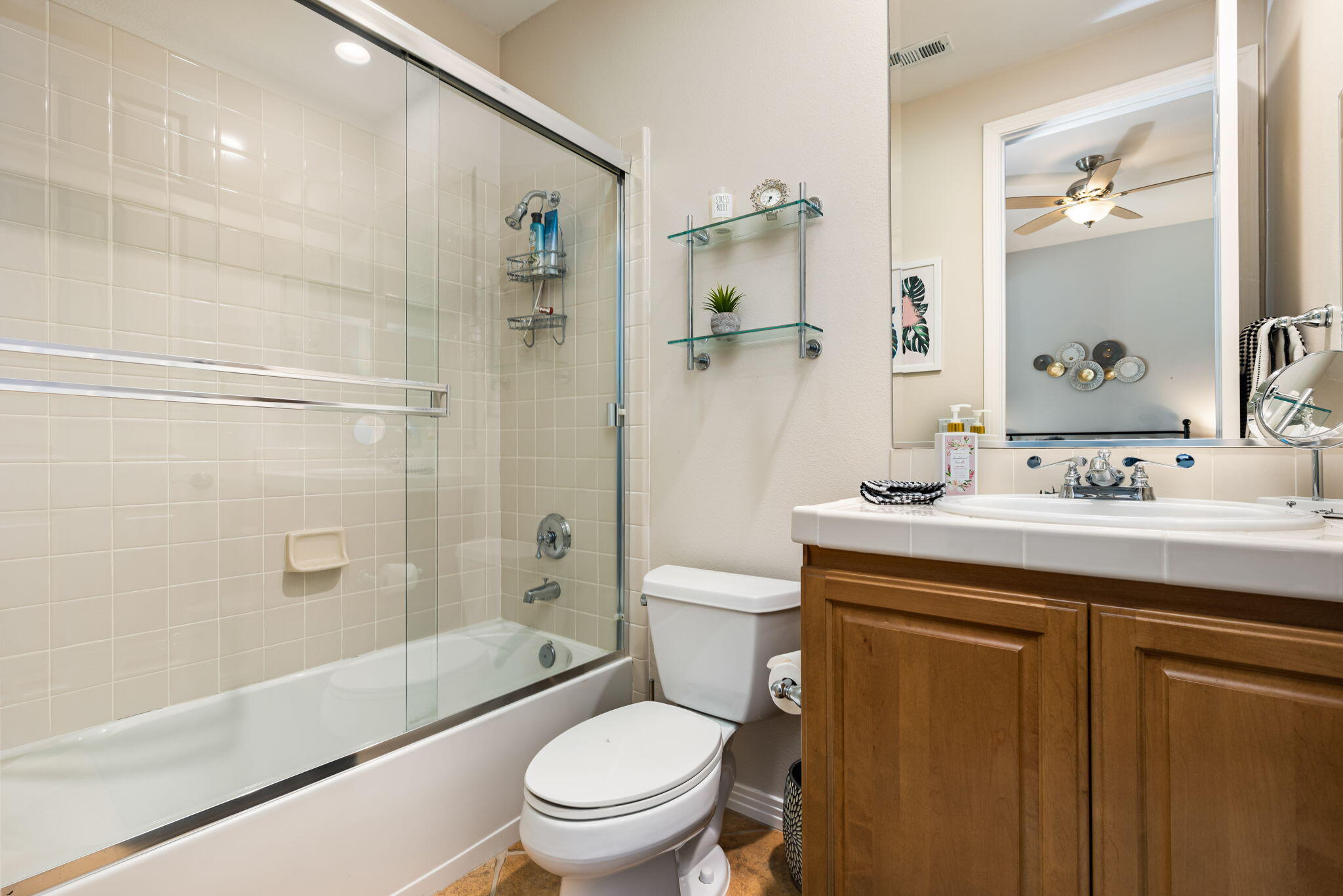 81260 Golf View Drive La Quinta, CA 92253 - Photo 33 of 58 a bathroom with a sink toilet and shower