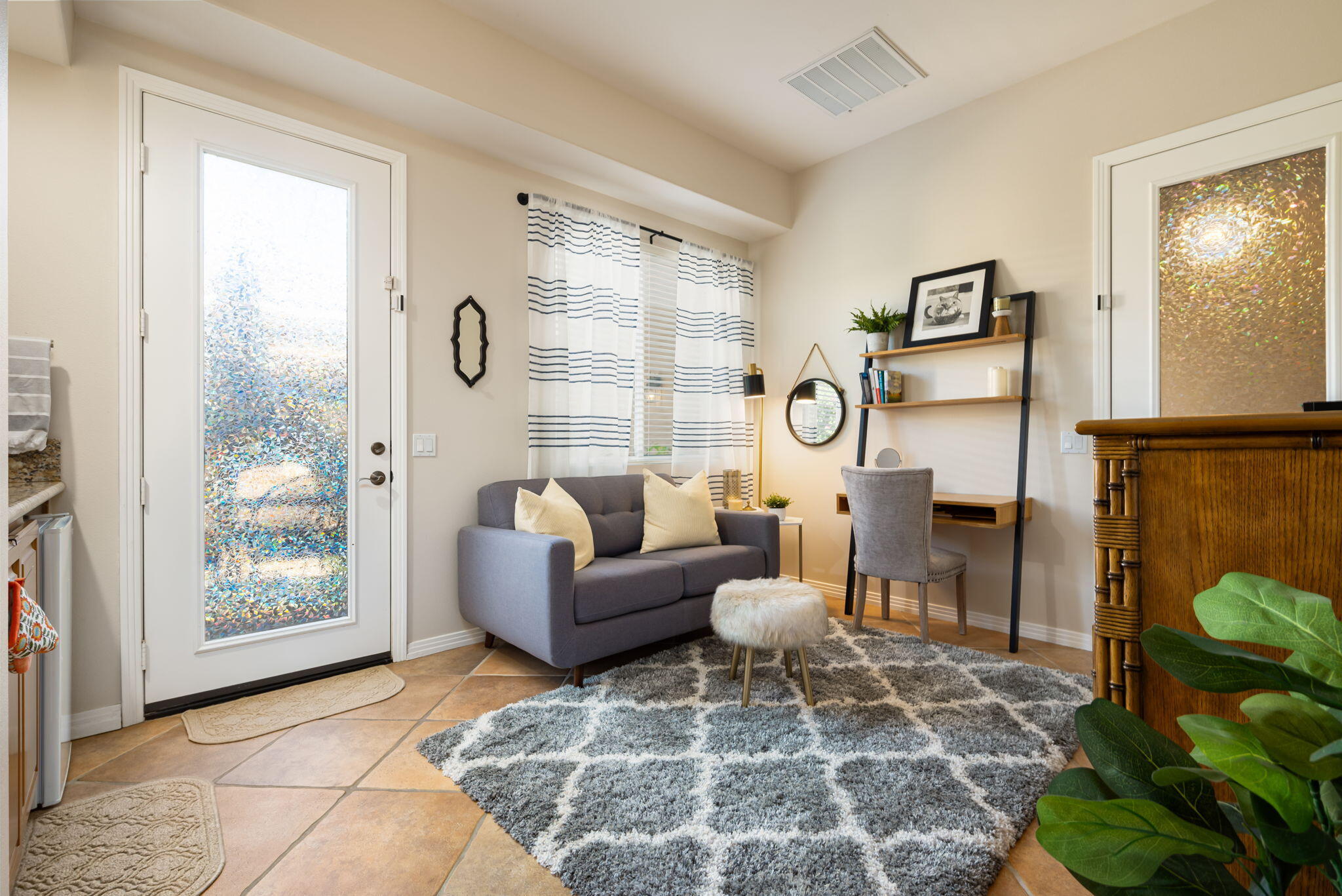 81260 Golf View Drive La Quinta, CA 92253 - Photo 39 of 58 a living room with furniture and a large window