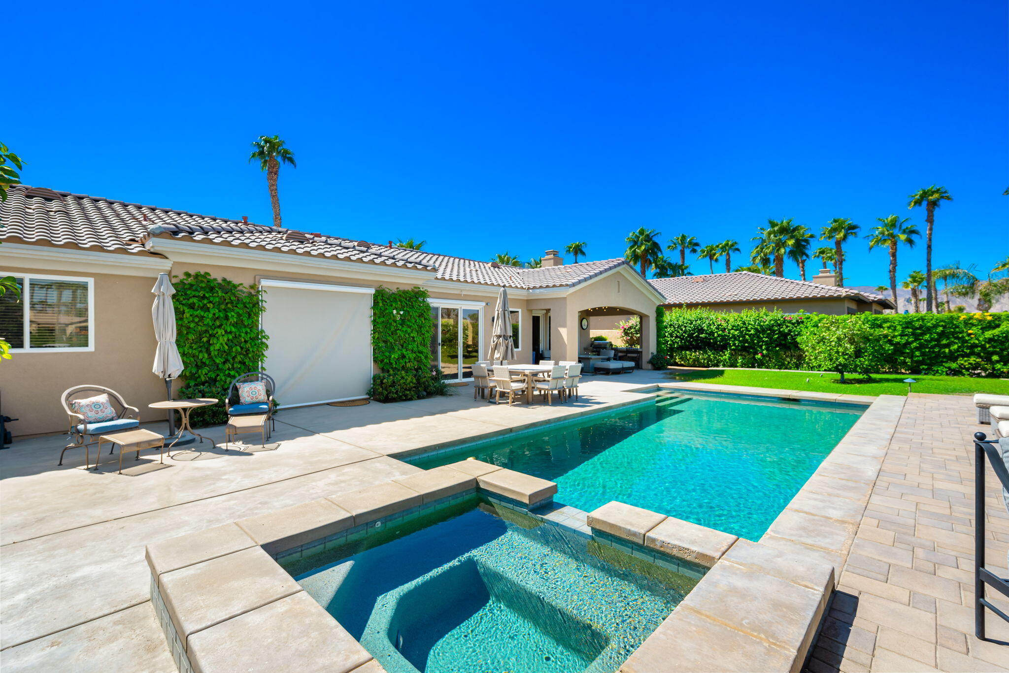 81260 Golf View Drive La Quinta, CA 92253 - Photo 42 of 58 a view of a house with backyard porch and sitting area