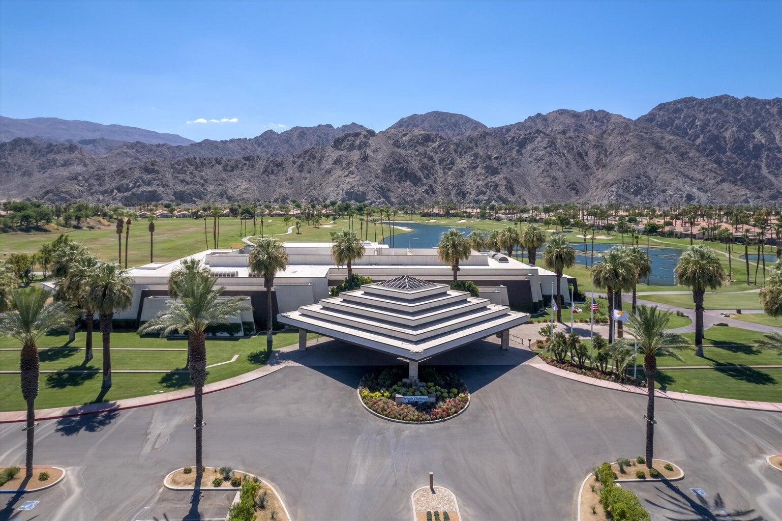81260 Golf View Drive La Quinta, CA 92253 - Photo 55 of 58 a view of a terrace with a table and chairs