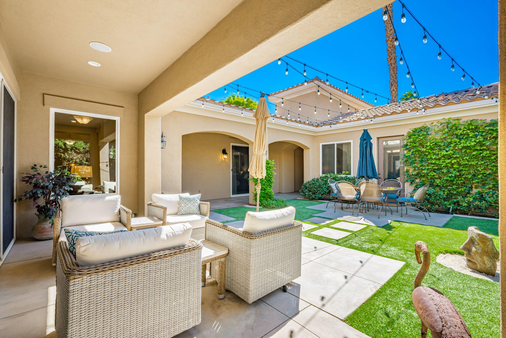 81260 Golf View Drive La Quinta, CA 92253 - Photo 9 of 58 a view of a house with swimming pool and furniture