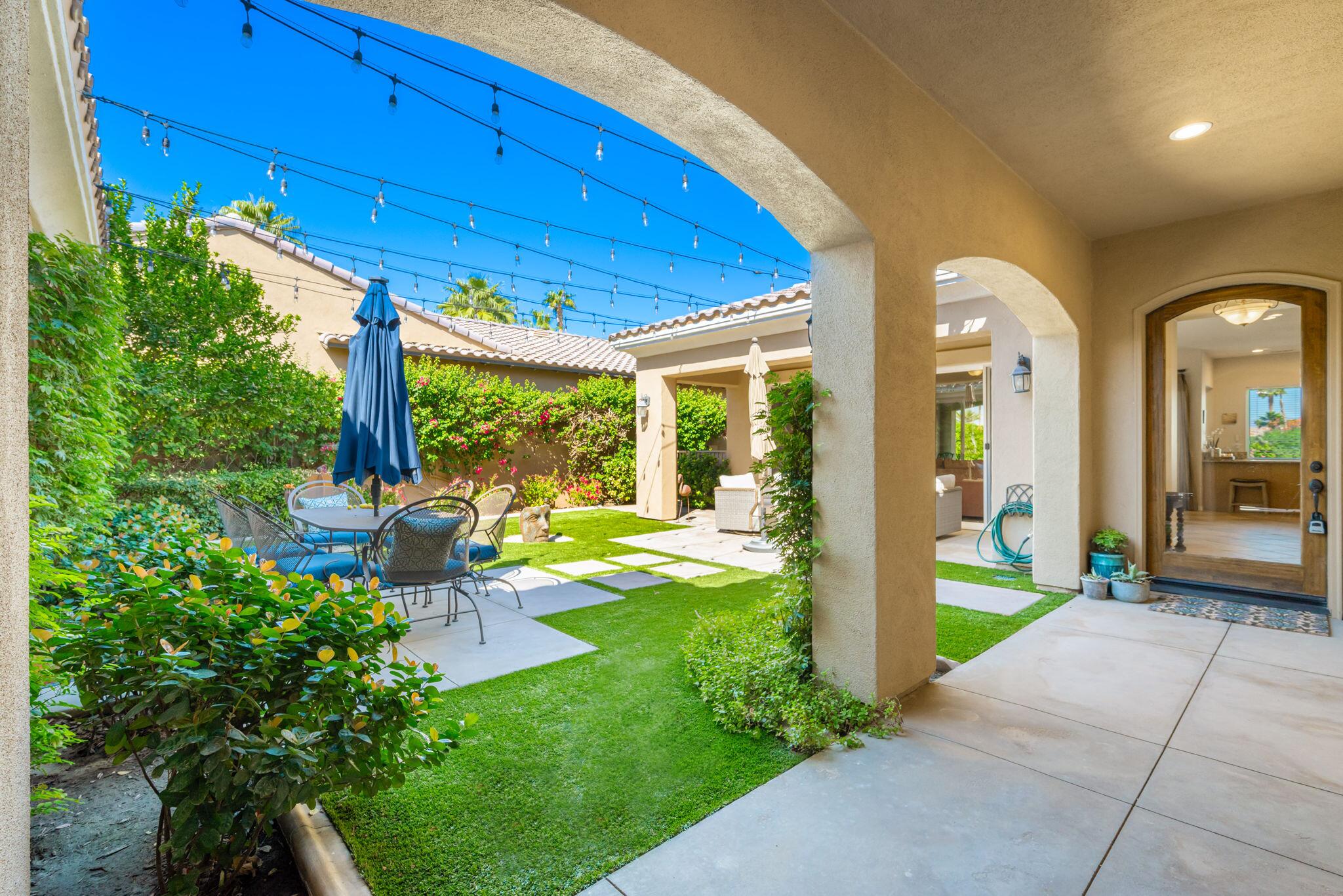 81260 Golf View Drive La Quinta, CA 92253 - Photo 10 of 58 a view of a house with backyard and porch