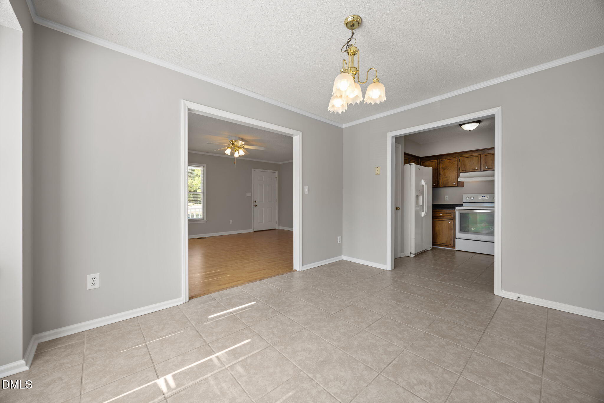 40 Circle Tree Lane Angier, NC 27501 - Photo 11 of 39 a view of an empty room with a chandelier