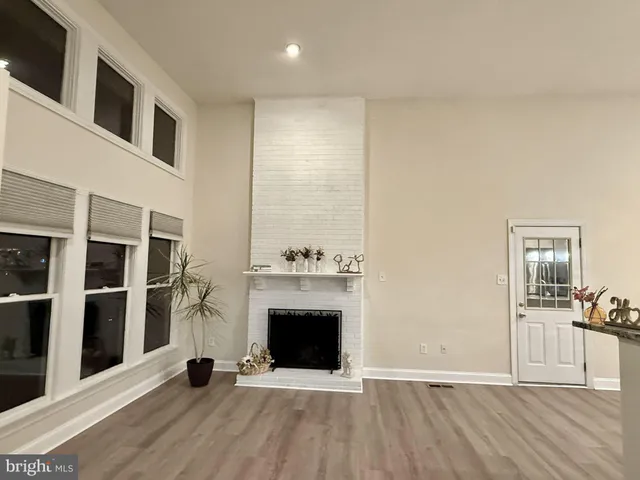 a kitchen that has a sink and a stove in it