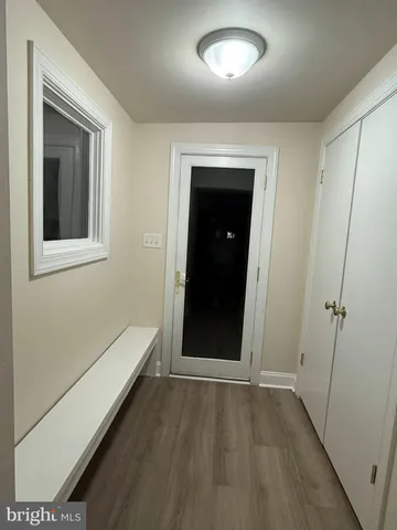 a bathroom with a toilet a sink and shower