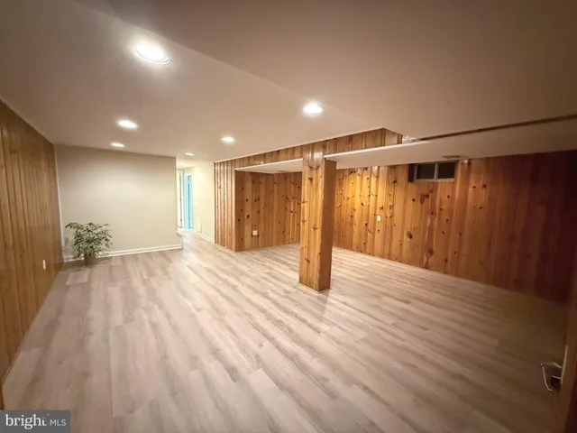 a bathroom with a shower and a bath tub