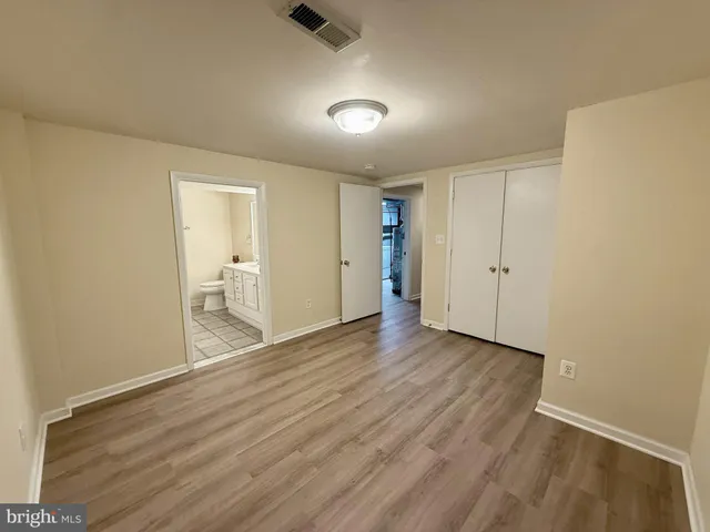 a bathroom with a sink a vanity and a mirror