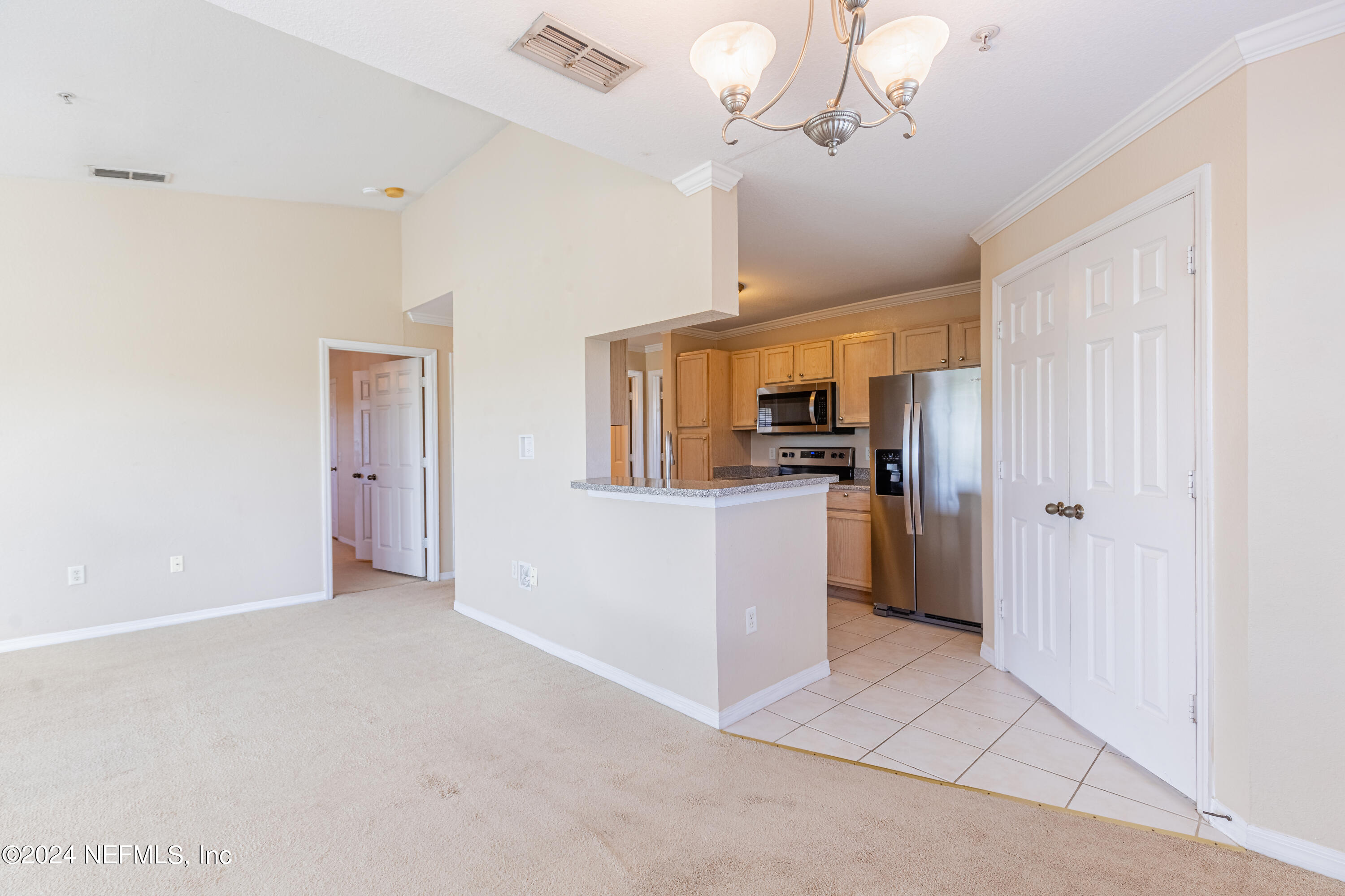 7800 Point Meadows Drive, Unit 1232 Jacksonville, FL 32256 - Photo 13 of 33 View of kitchen and lundry room door