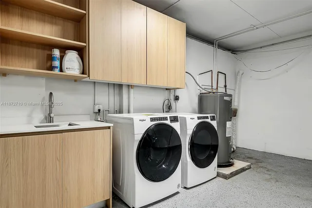 a utility room with dryer and washer